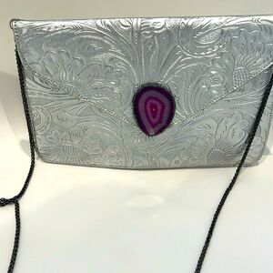 Never used carved handbag. Better in person.